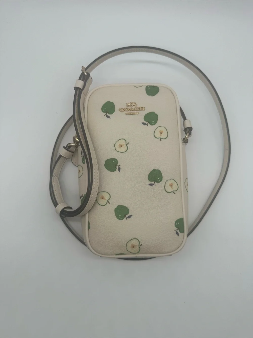 Coach Cream Crossbody Phone Pouch with Green Apple Motif